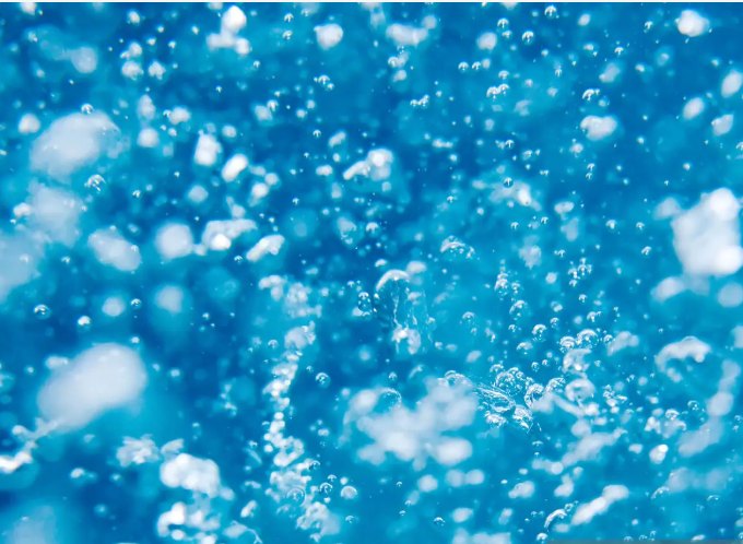 Bubbles expanding in water