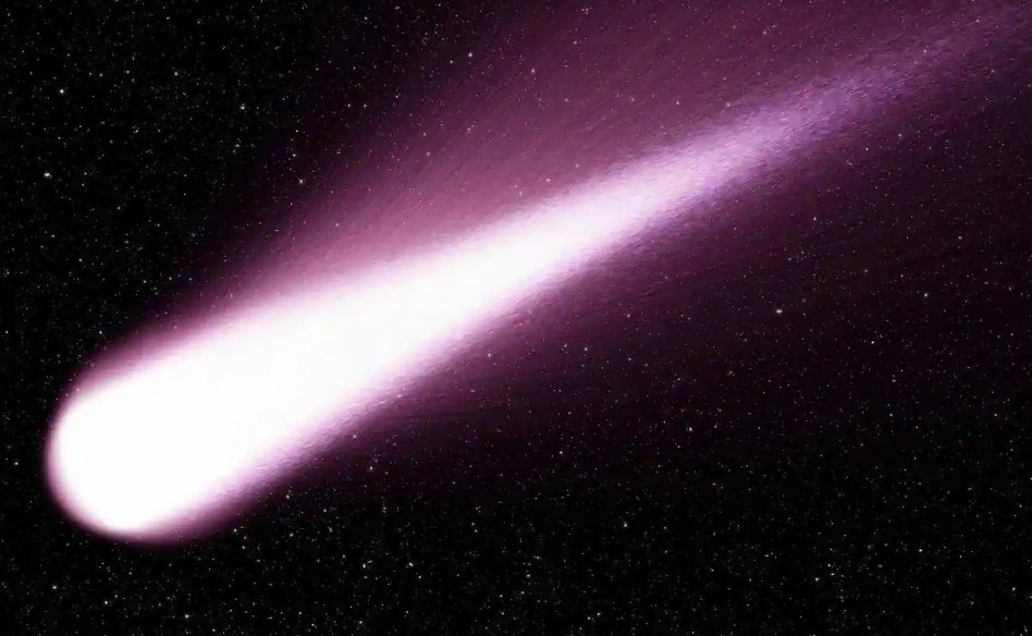 Comet moving through space with bright head and long tail