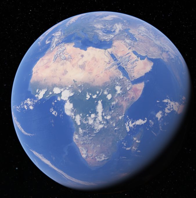 Satellite view of the globe centred on Africa, the Sahara pale across the north, the Congo green at the centre, the Mediterranean and Red Sea at the top.