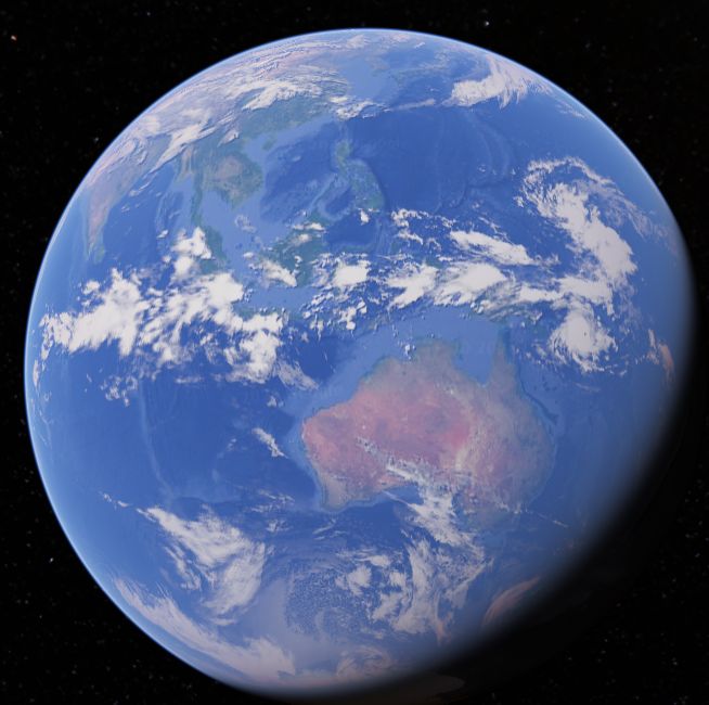 Satellite view of the globe centred on Australia, the red centre visible, south-east Asia and the Indonesian archipelago spread across the upper half.